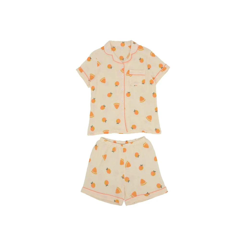 Children's Anna Kaci Fruit Pattern Lounge Coordinates with a peach print, consisting of a short-sleeved shirt and matching shorts, displayed on a white background.