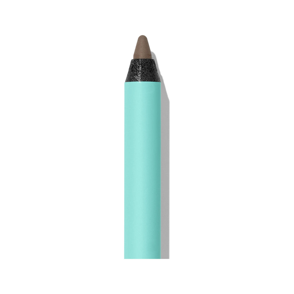 A single turquoise eye pencil against a white background.