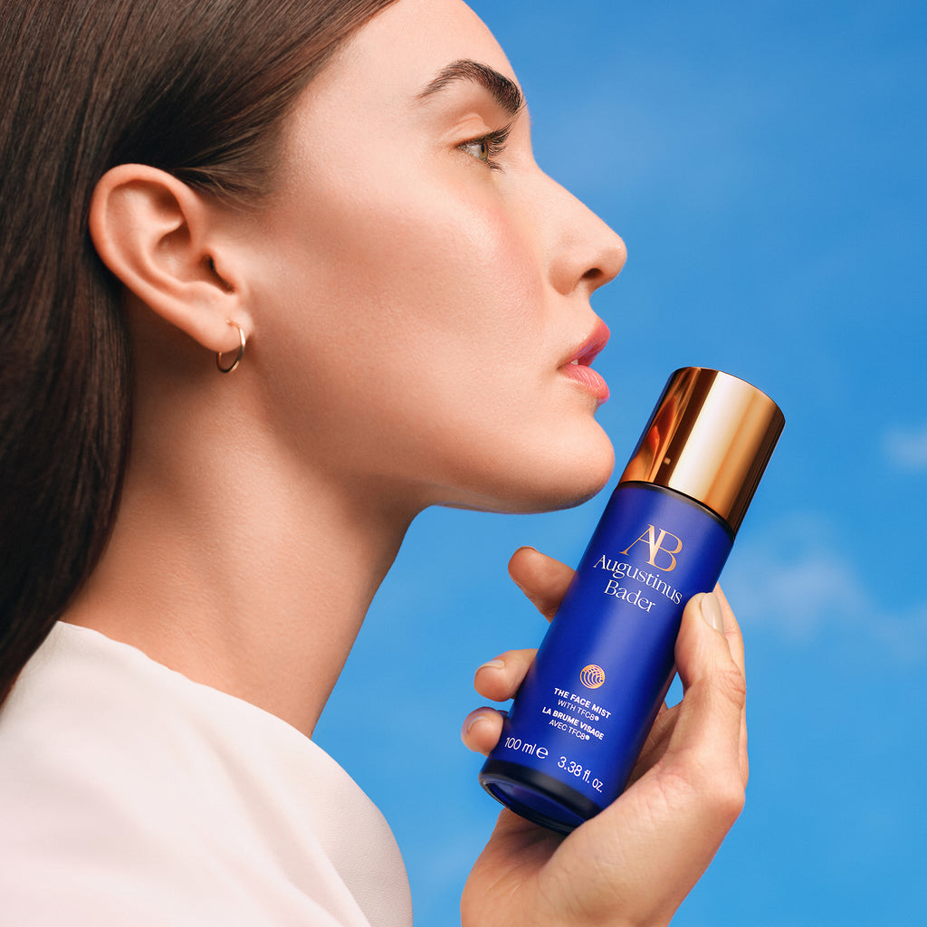 Woman Holding The Face Mist