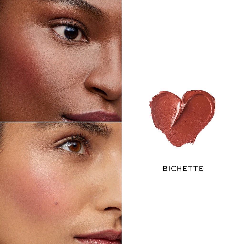 Close-up of a woman's face showcasing makeup with a swatch of Westman Atelier Baby Cheeks Blush Stick shaped like a heart above, featuring natural ingredients.