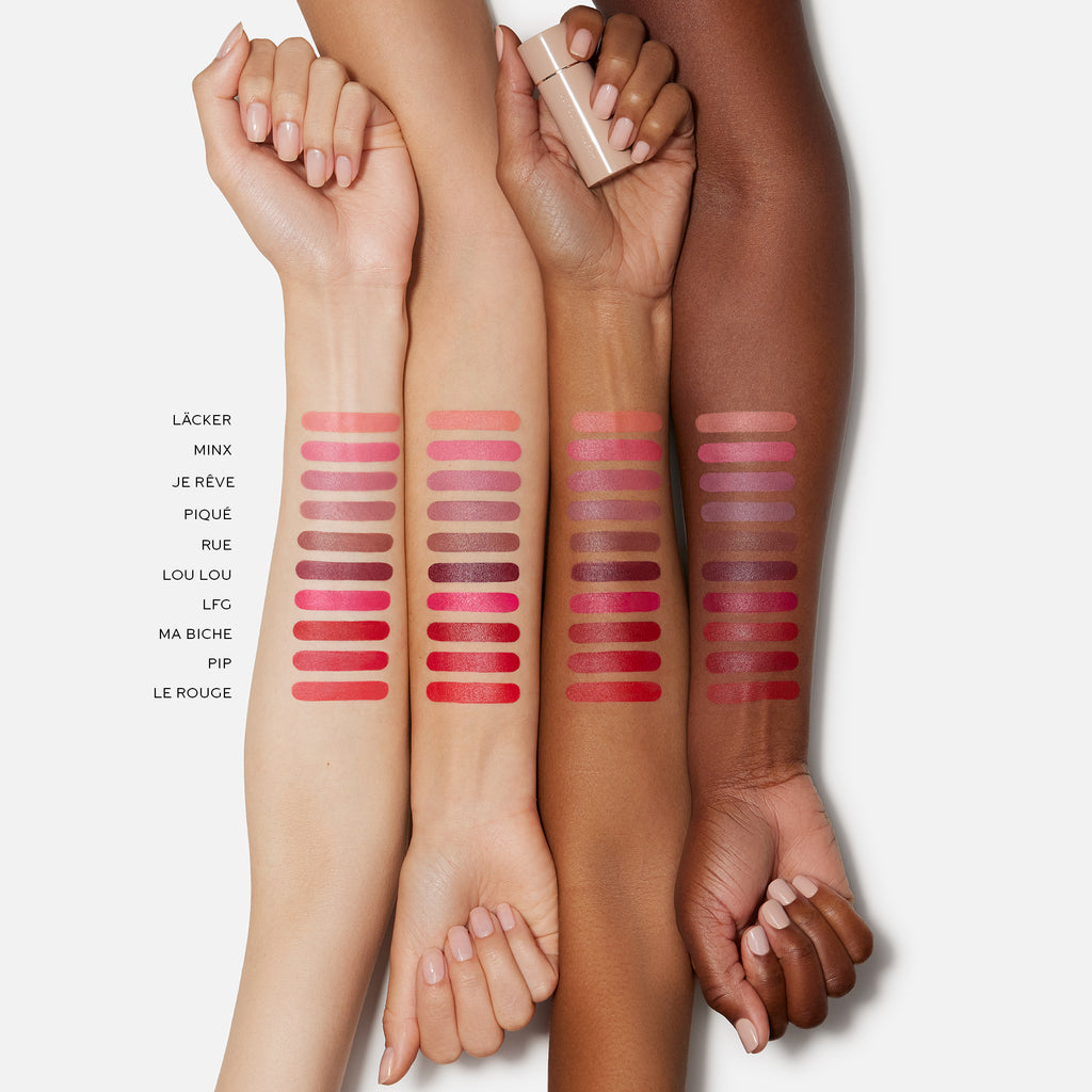 Swatches of various shades of lipstick displayed on forearms of people with different skin tones.