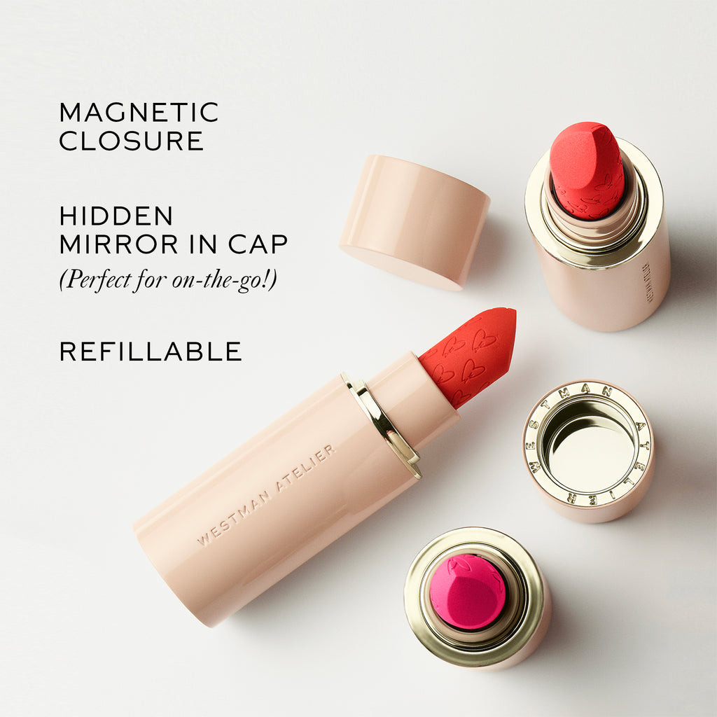 Designer lipstick with magnetic closure, hidden mirror in cap, and refillable design.