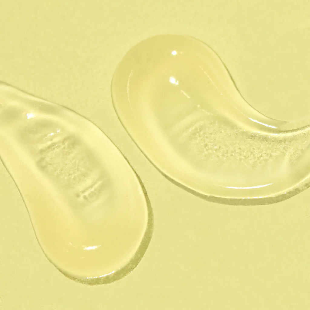 Two Bask Daily Invisible Gel SPF 40 shoe insoles on a yellow background.