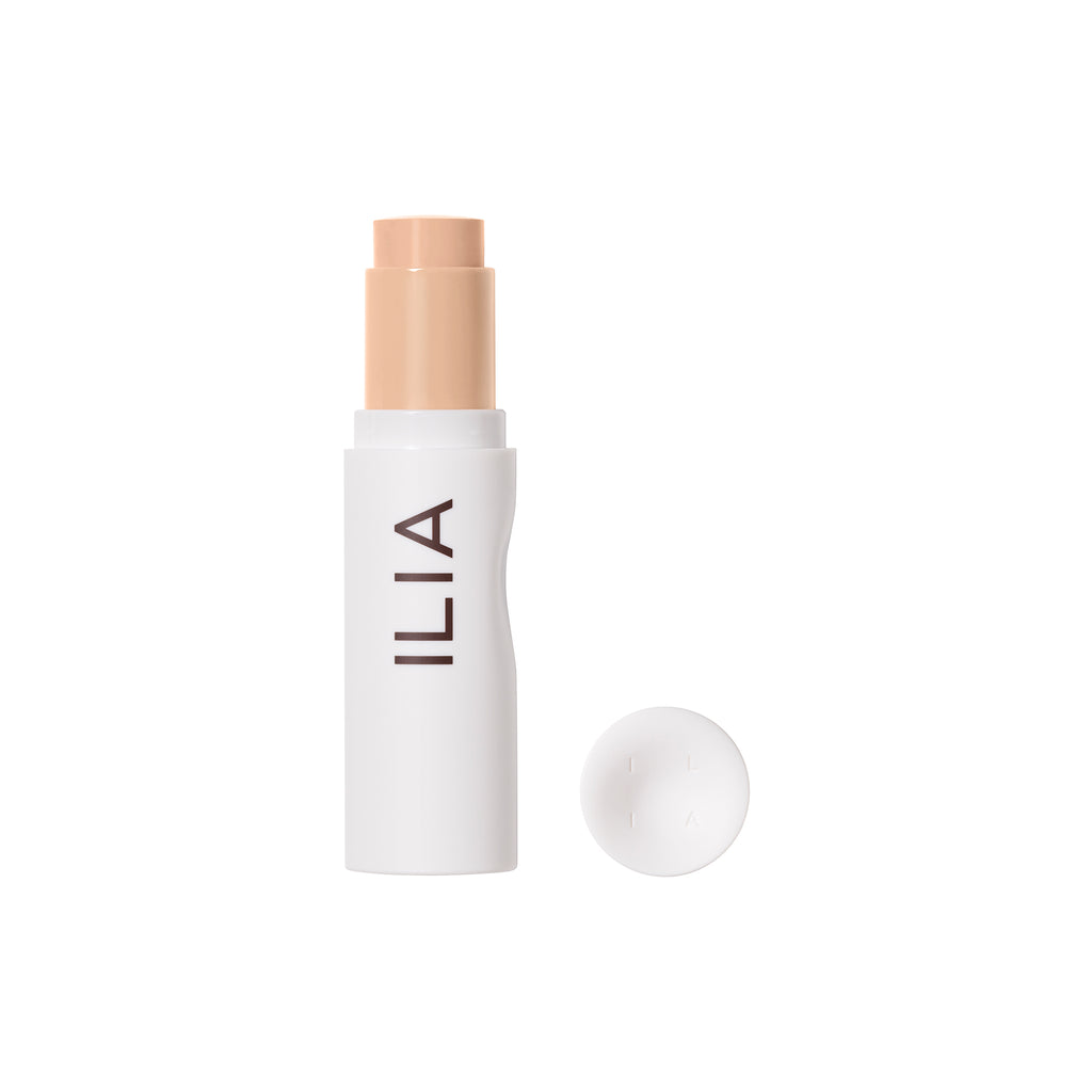 Container of ilia brand foundation stick with cap removed.
