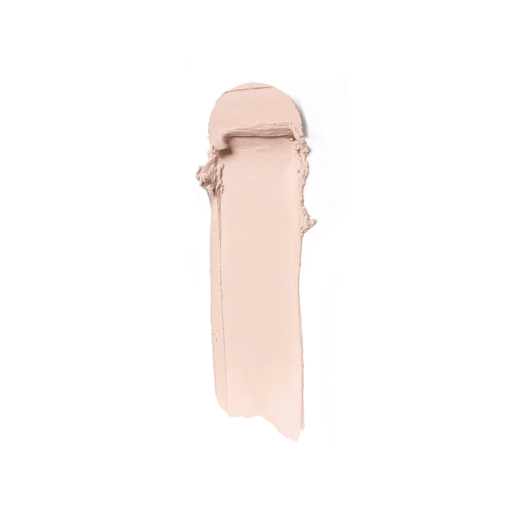 A swatch of beige liquid foundation makeup smeared against a white background.