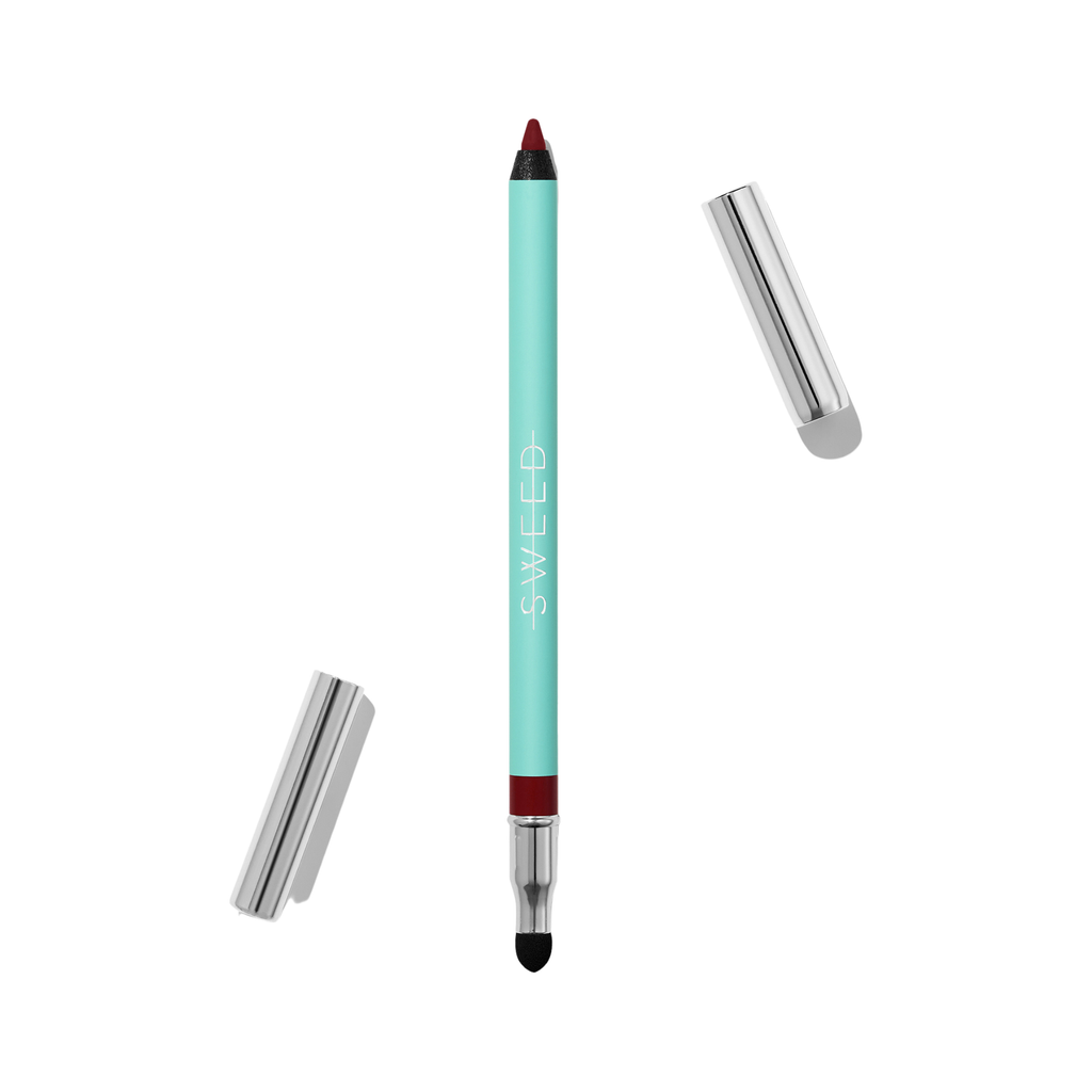 A cosmetic pencil with a red tip and two caps, one removed and one attached, isolated on a white background.
