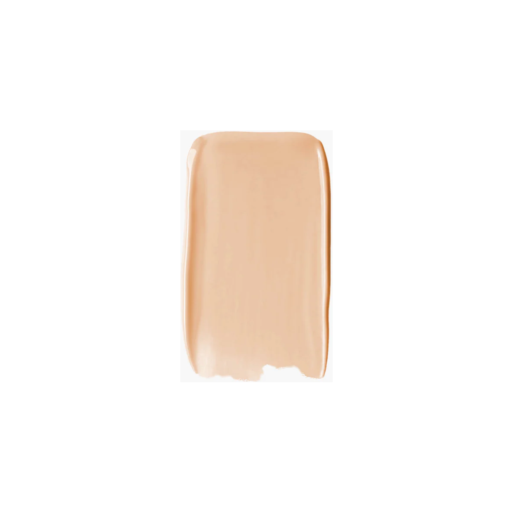 A swatch of Sweed Glass Skin Foundation makeup smoothly spread, isolated on a white background.