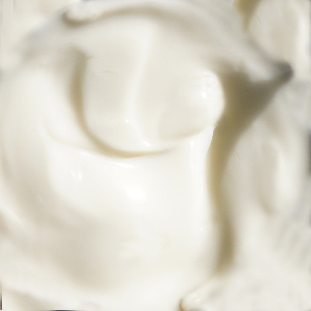 Close-up of creamy white substance with swirls.