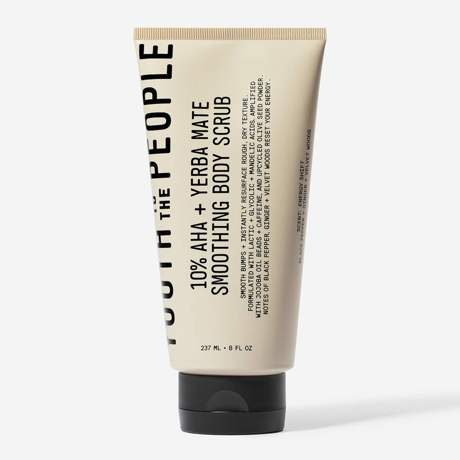 Tube of "Youth To The People 10% AHA + Yerba Mate Smoothing Energy" body scrub for sensitive skin with a 10% AHA + yerba mate formula, shown against a white background.