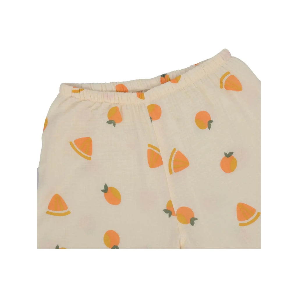 Casual light-colored cotton Anna Kaci Fruit Pattern Lounge Coordinates shorts with a playful fruit pattern of whole and sliced oranges.