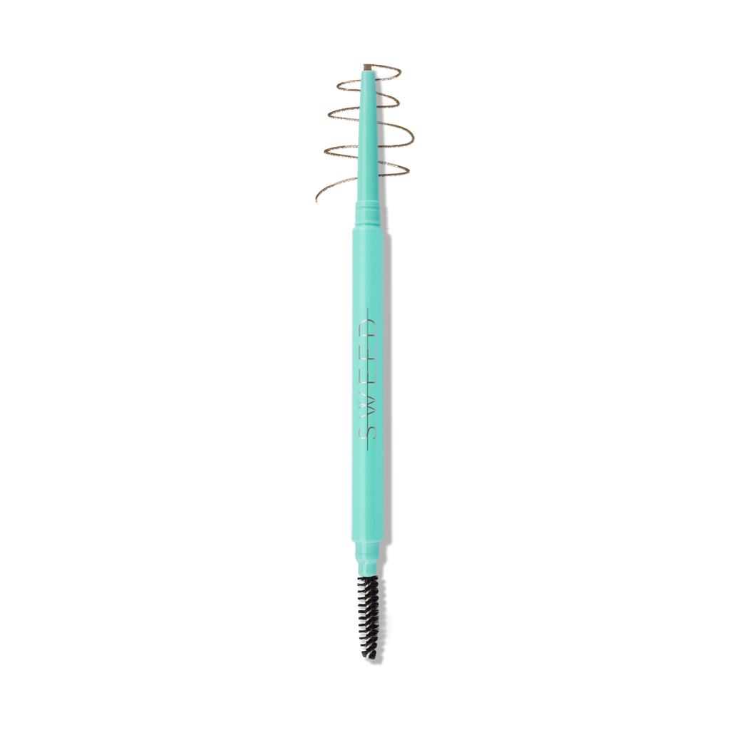 A teal-handled eyelash curler with an integrated brush.