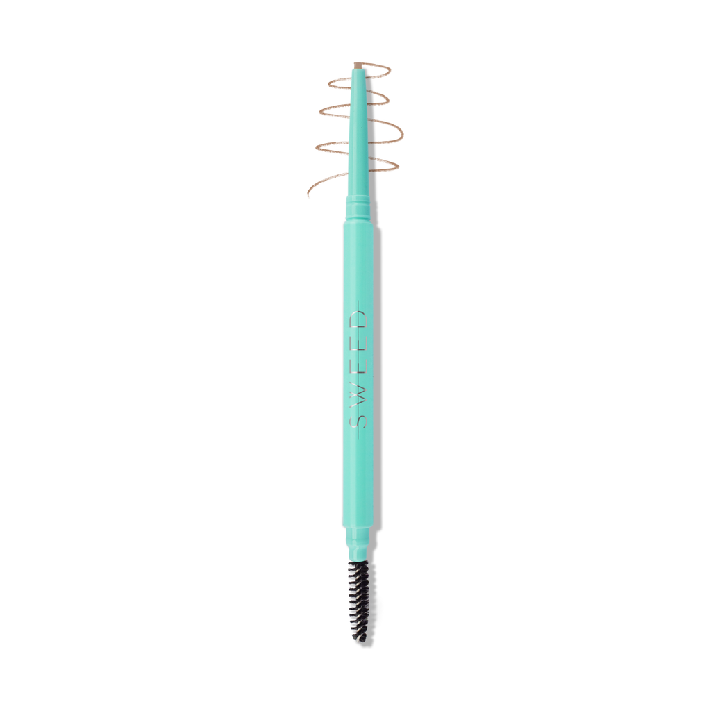 Aqua-colored eyebrow brush with a spoolie on one end and a slanted metal coil on the other for shaping eyebrows.