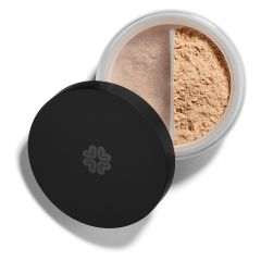 Open container of loose powder makeup with a black lid.
