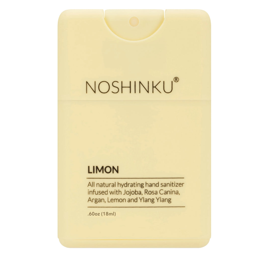 A portable bottle of noshinku limon hand sanitizer with natural ingredients like jojoba, rosa canina, argan, lemon, and ylang ylang.