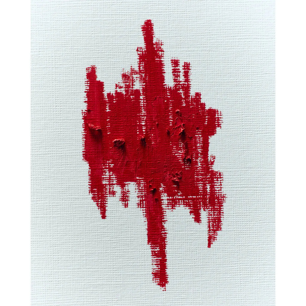 Abstract red brushstroke on a white canvas.