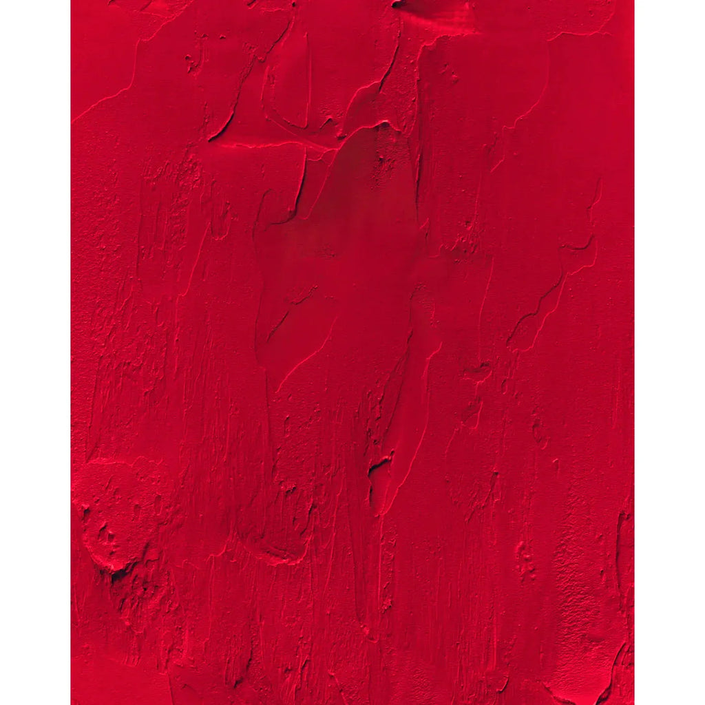 A textured red surface with visible cracks and irregularities.
