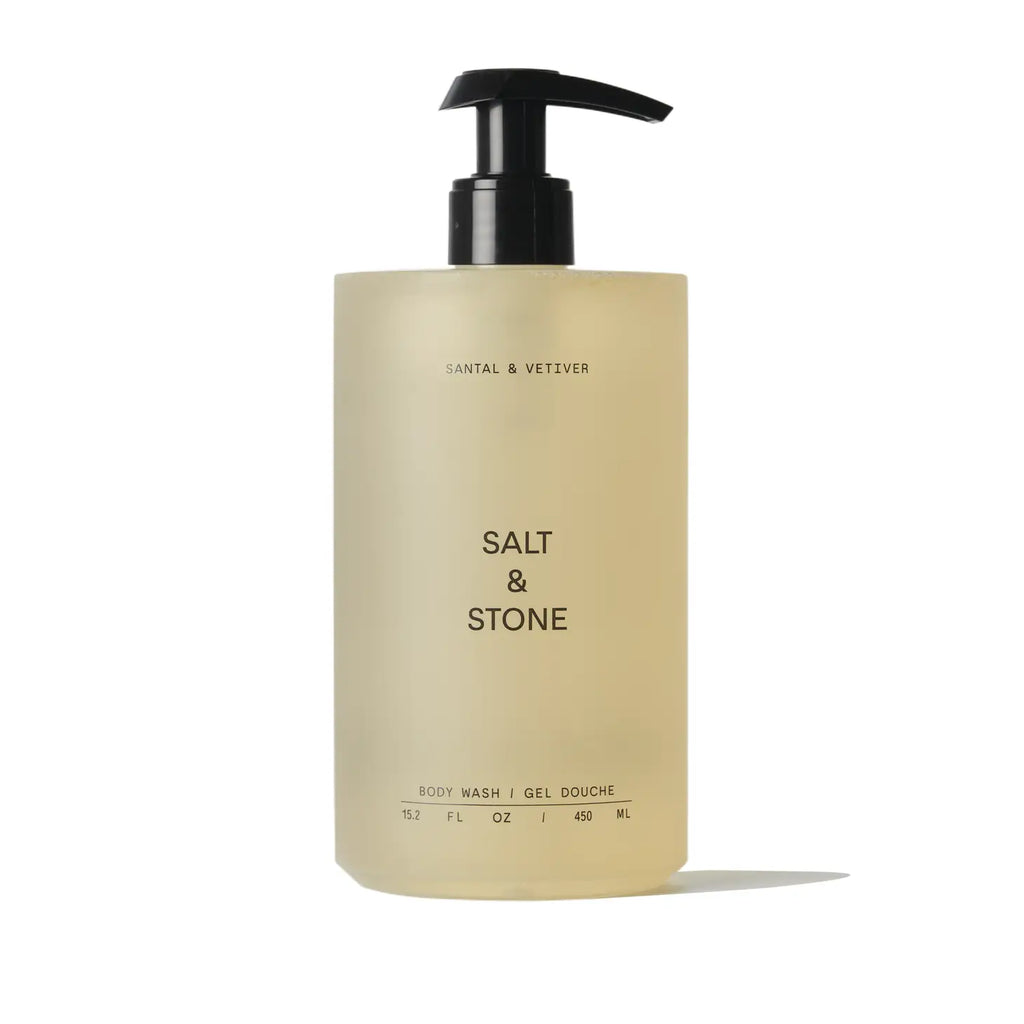 A bottle of santal and vetiver scented salt & stone body wash.