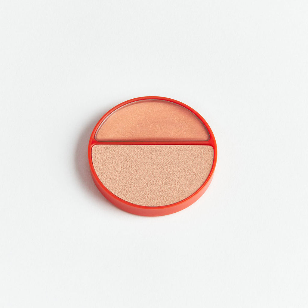 Compact blush with two shades against a white background.