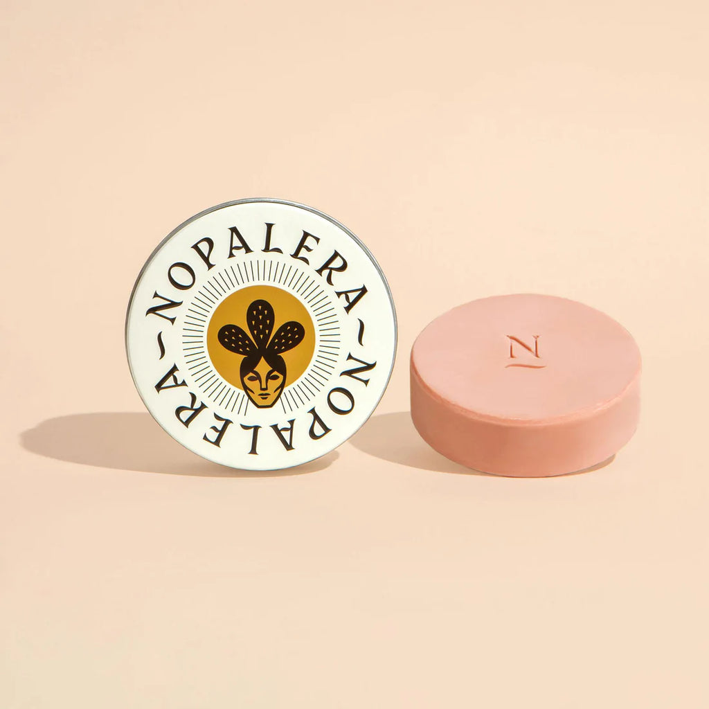 Two nopalera branded skincare products on a neutral background.