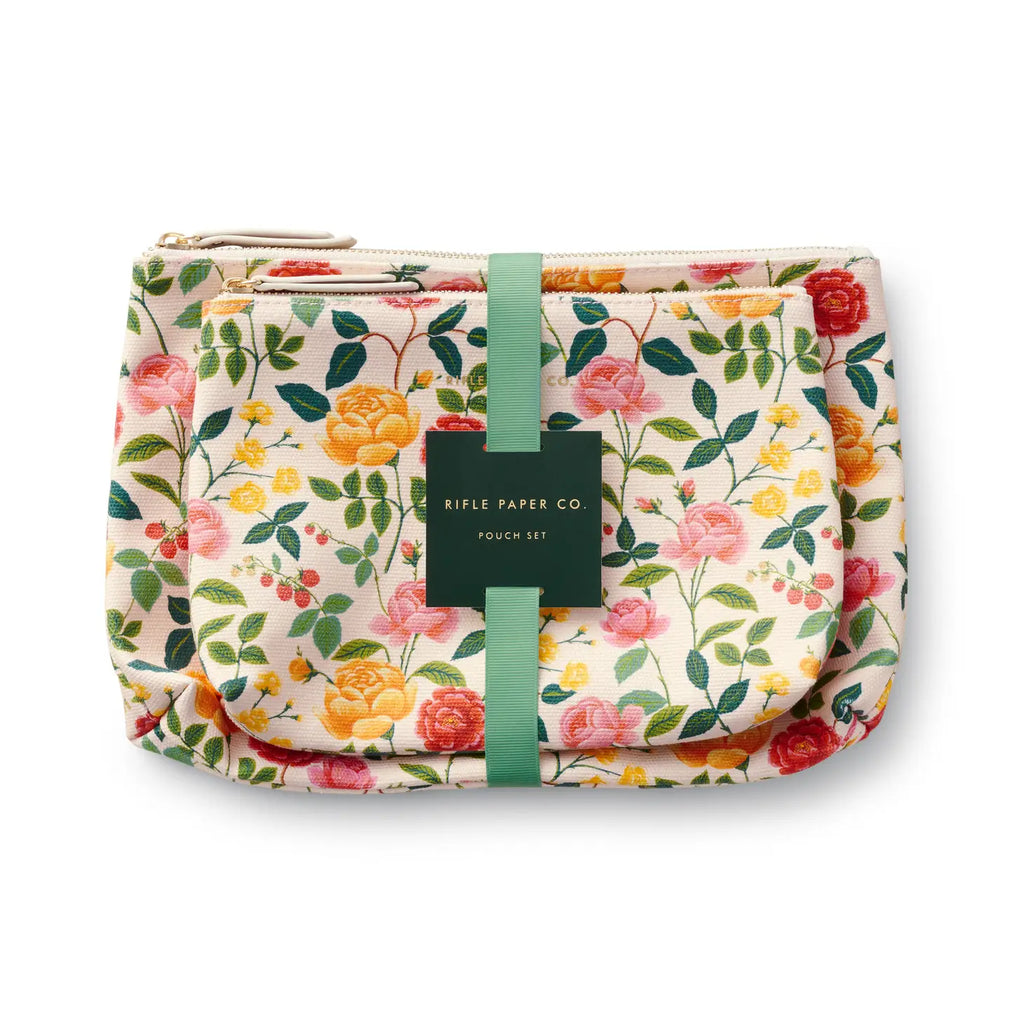 Floral patterned pouch with a brand label.