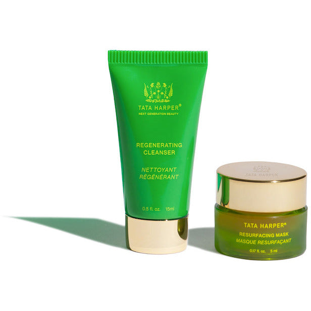 Two tata harper skincare products: a regenerating cleanser in a green tube and a resurfacing mask in a green and gold jar.