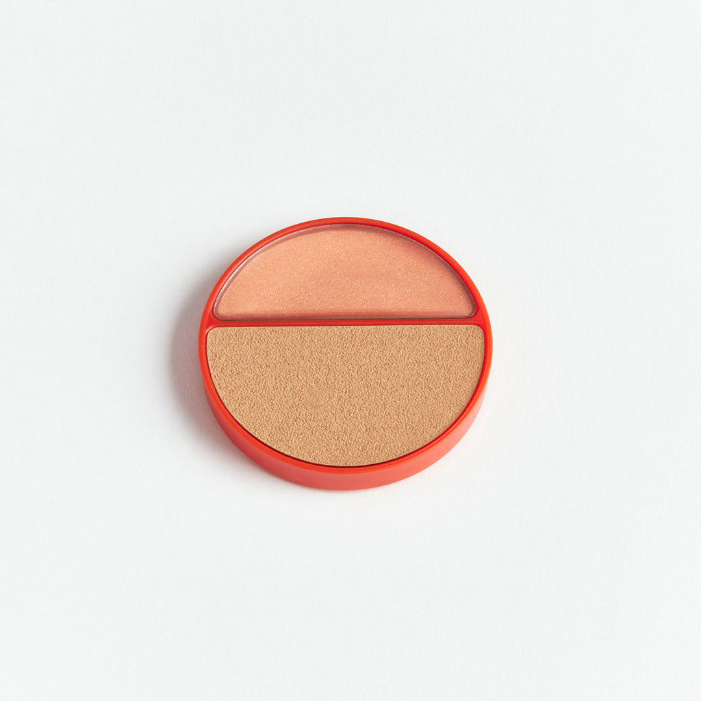 A two-shade powder compact against a white background.