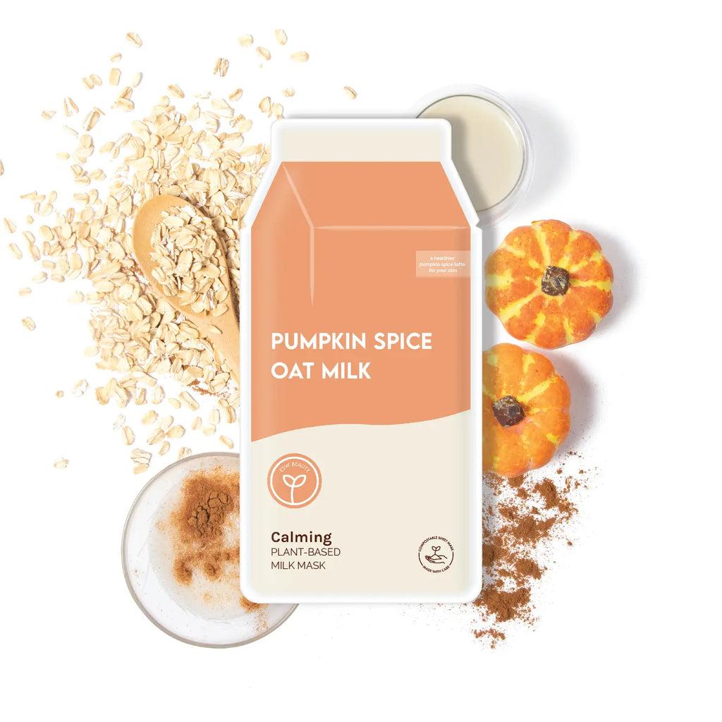 Flat lay composition with pumpkin spice oat milk carton, oats, mini pumpkins, and spices.