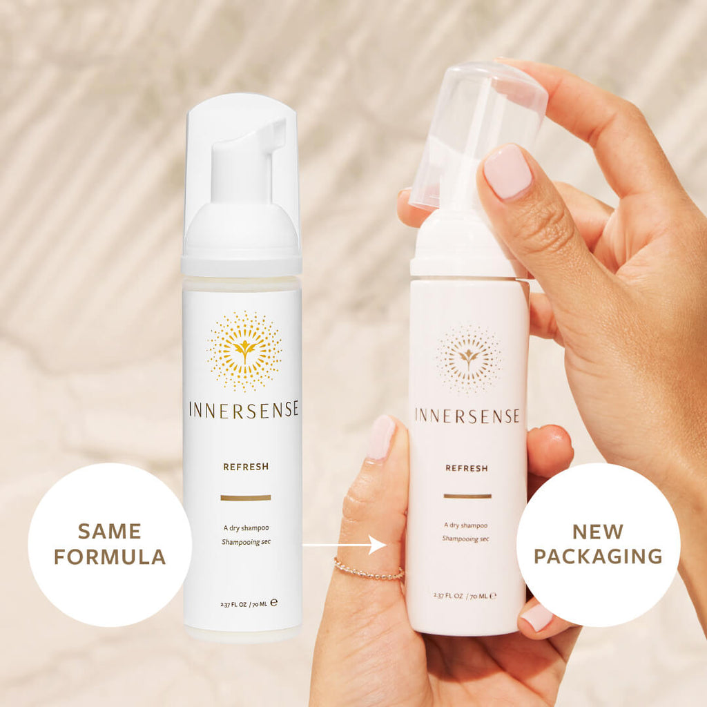 Two different packages of innersense dry shampoo, highlighting the transition to new packaging while maintaining the same formula.
