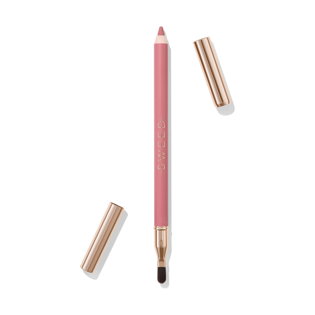 A lip liner pencil with a brush and cap on a white background.