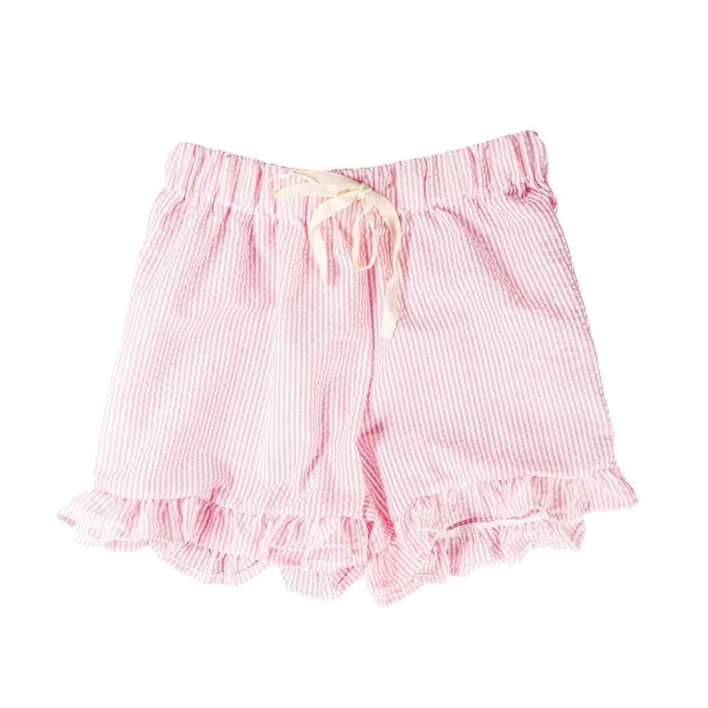 Violet & Brooks Skylar Ruffle Shorts - Pink with ruffled hems and a drawstring bow, displayed against a white background.
