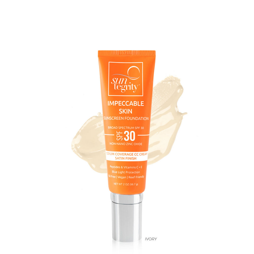 A tube of sunscreen foundation with a swatch of the product displayed in the background.