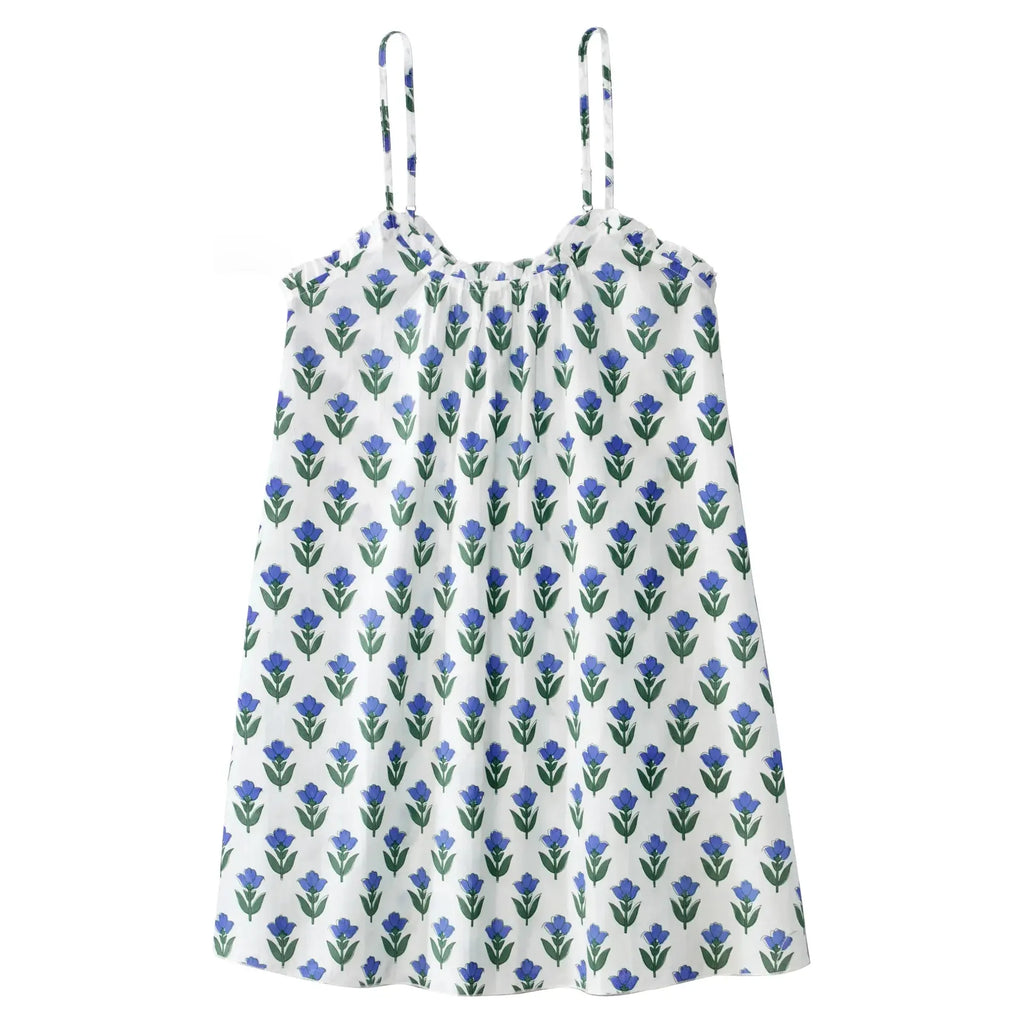 Germaine des Prés Hortense Blue Flower Nightdress with thin straps, made from 100% cotton. The dress features a delicate pattern of blue and green flower motifs.