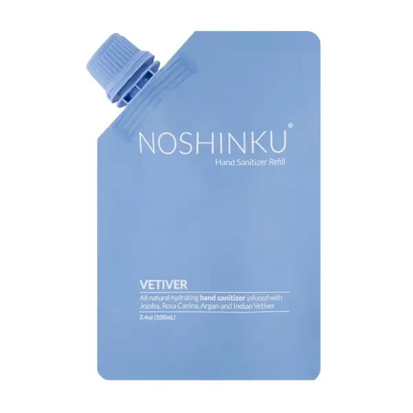 A blue noshinku hand sanitizer refill pouch with vetiver scent.
