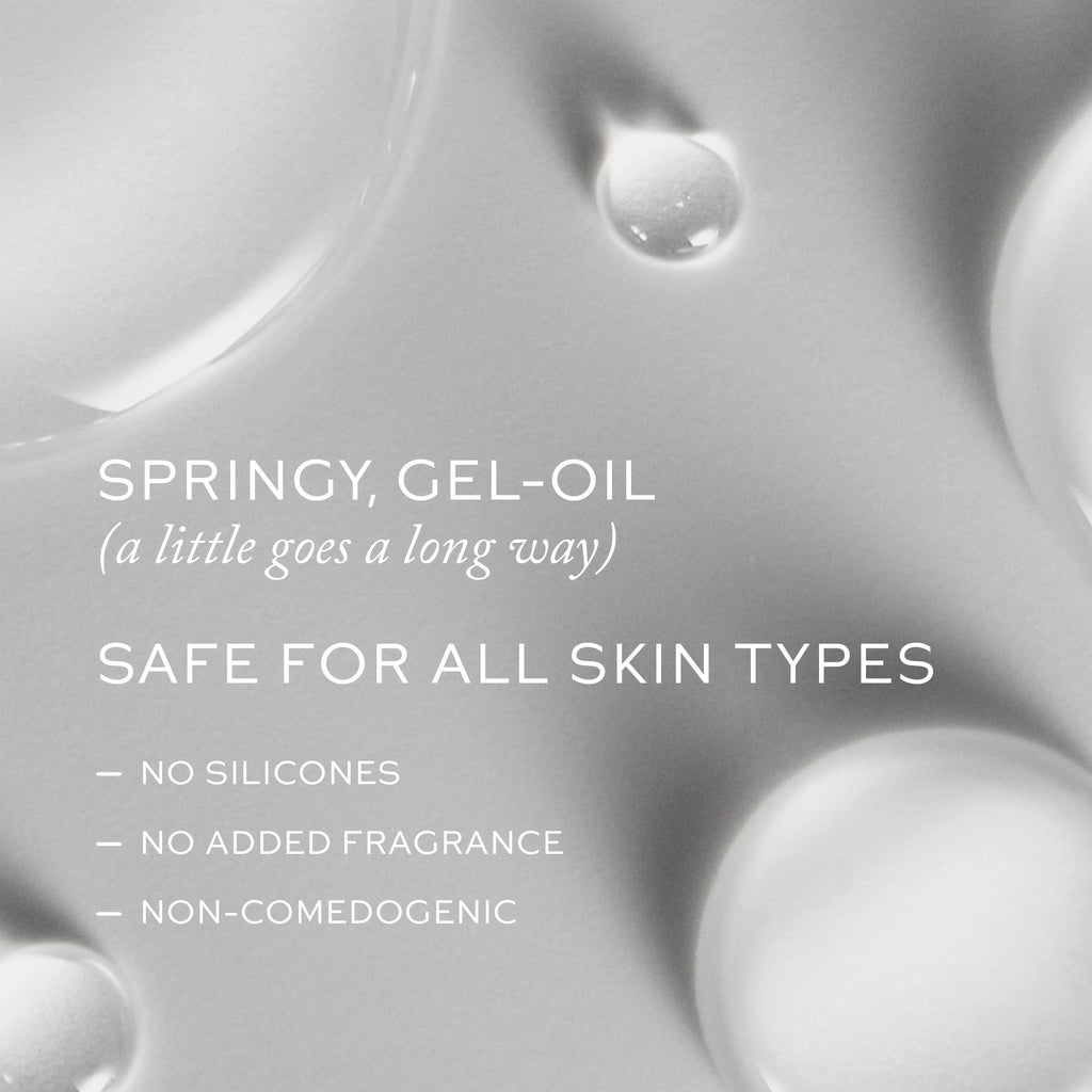 Close-up of transparent Westman Atelier Suprême C serum with droplets, text overlay highlighting its suitability for all skin types, non-silicone and fragrance-free features.