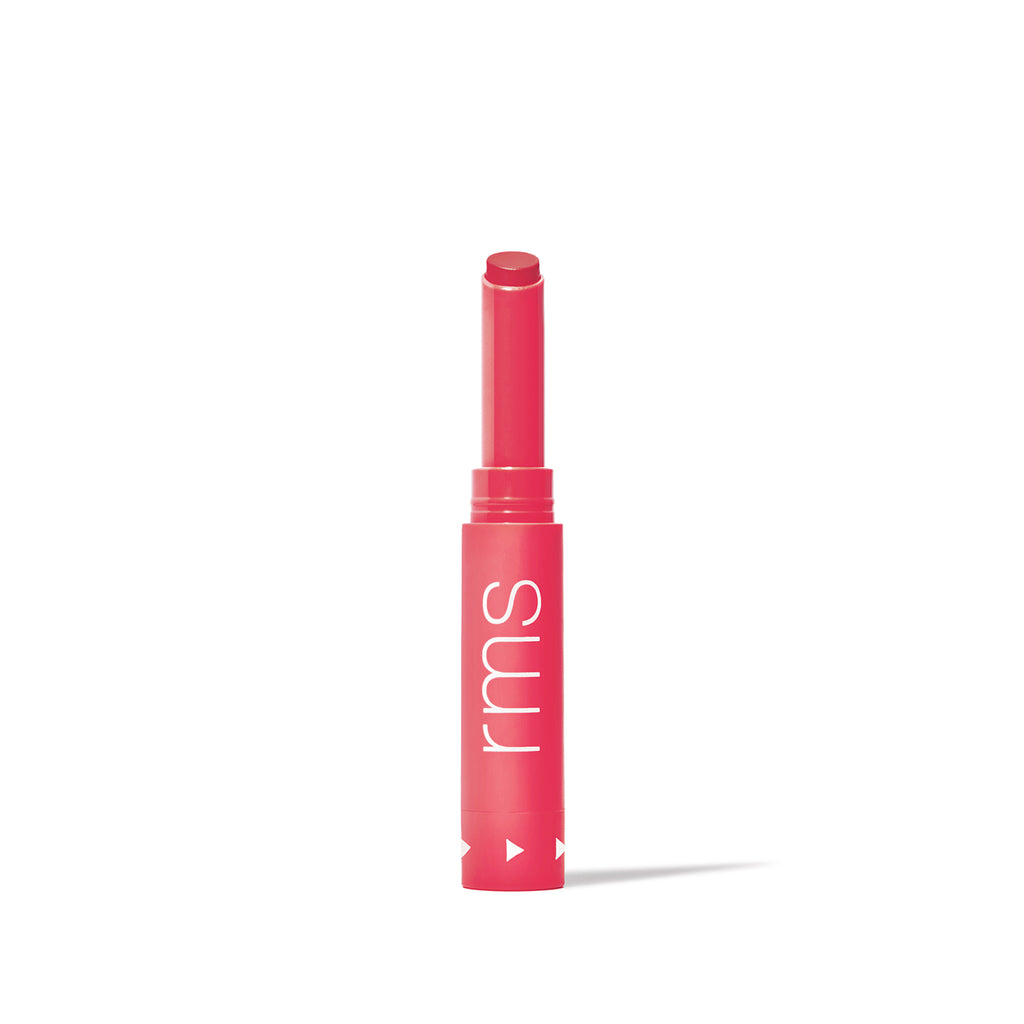 A single tube of pink lipstick against a white background.