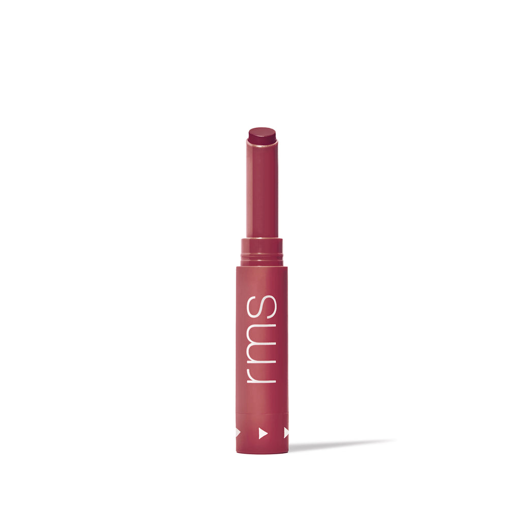 A single tube of maroon lipstick against a white background.