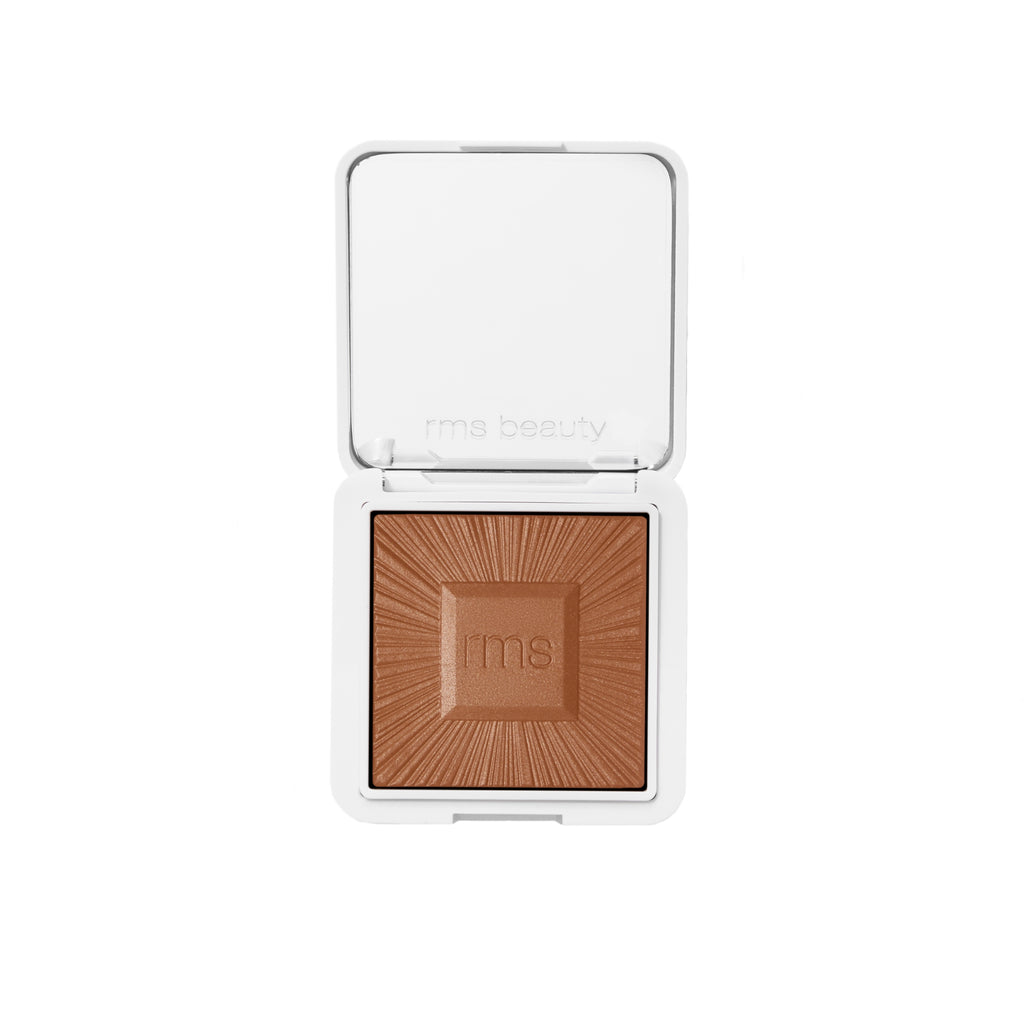 Rms beauty pressed powder compact with mirror.