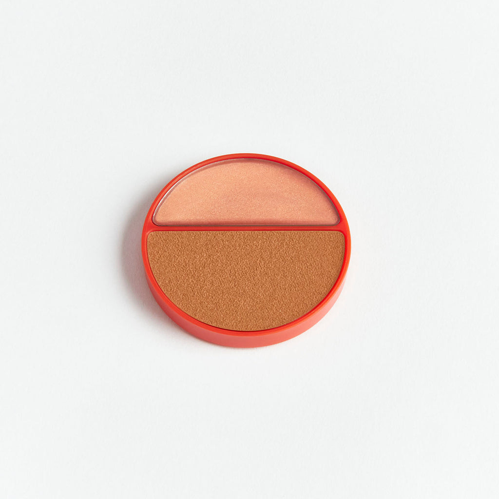 Dual-shade bronzing compact on a white background.