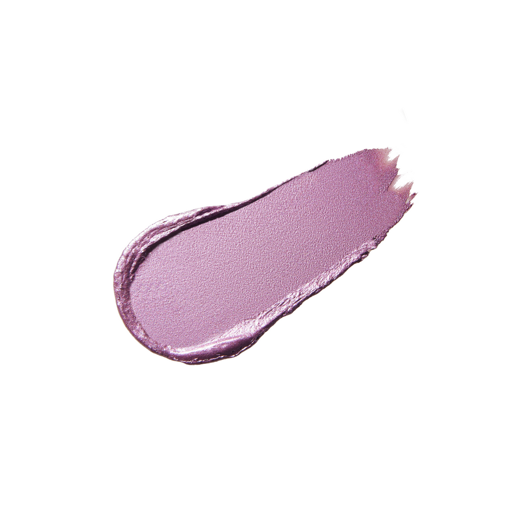A smear of shimmery purple lipstick on a white background.