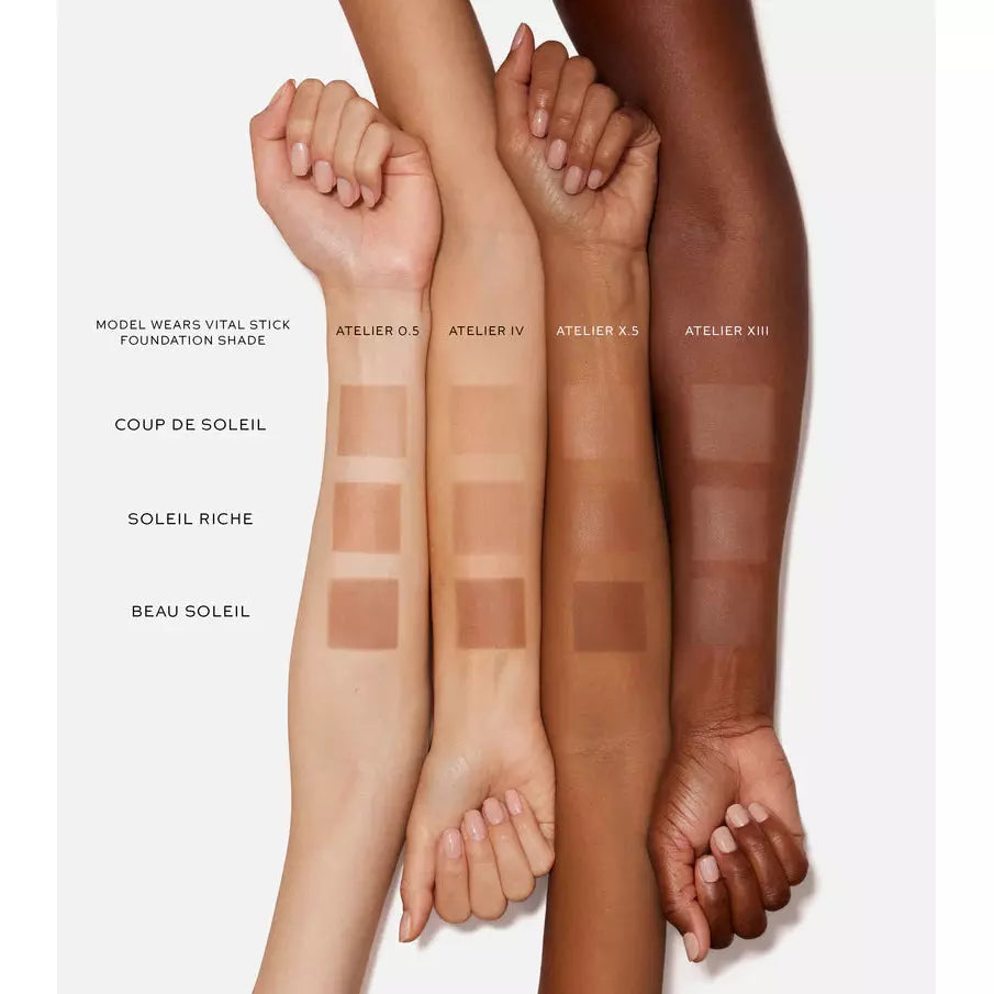 Four arms of varying skin tones displaying swatches of different foundation shades.