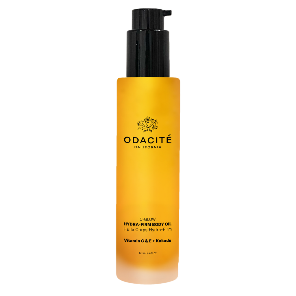Bottle of odacite hydra-firm body oil with vitamin c & e and kakadu plum.
