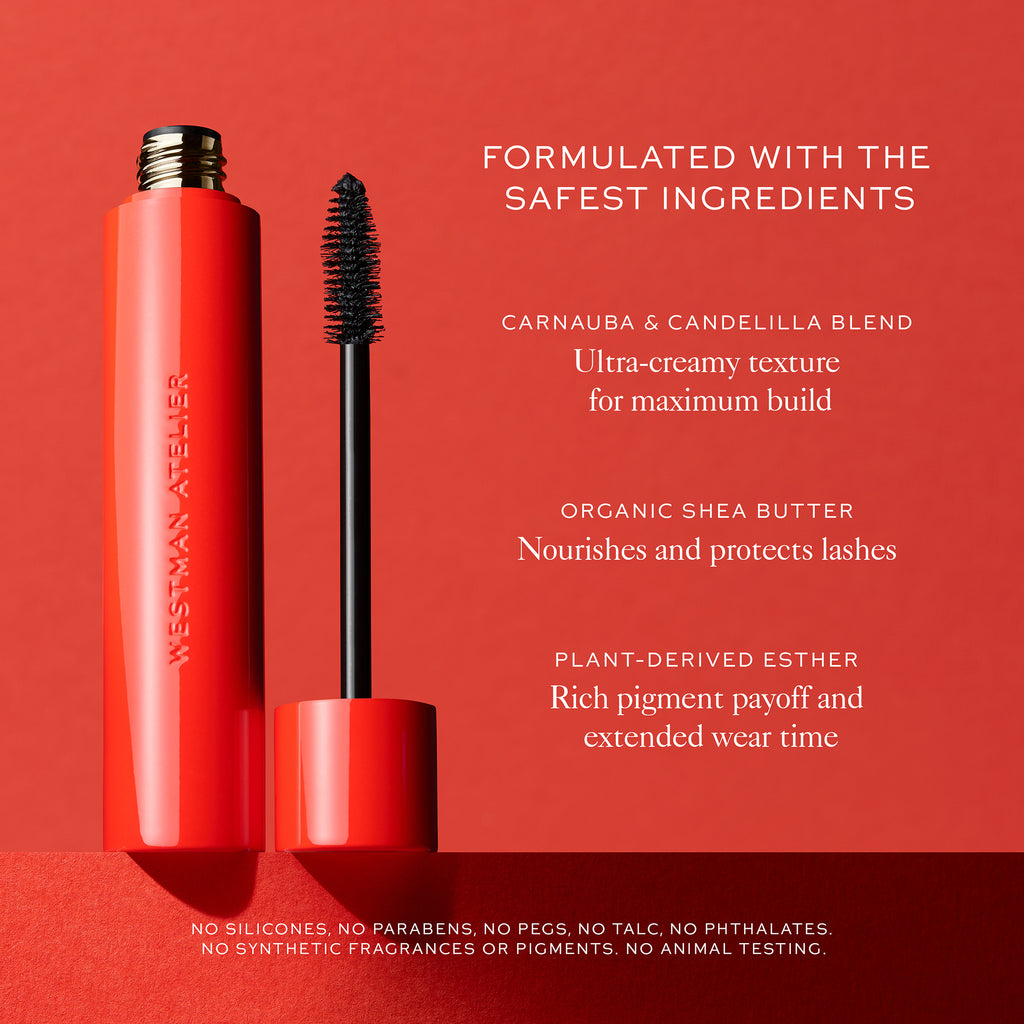 A red mascara tube with an open cap and brush displayed alongside a list of its plant-derived ingredients and product benefits on a matching red background.
