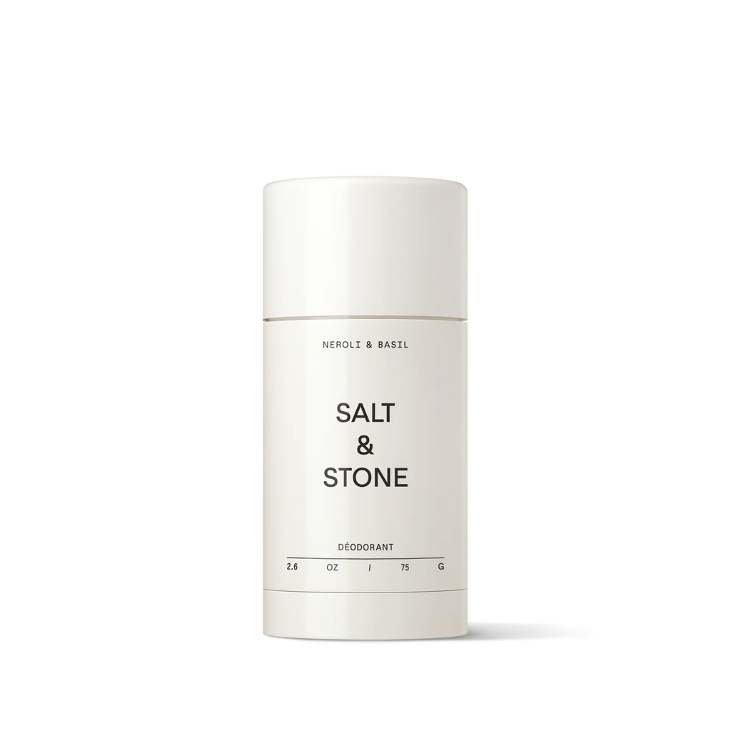 A container of salt & stone deodorant against a white background.