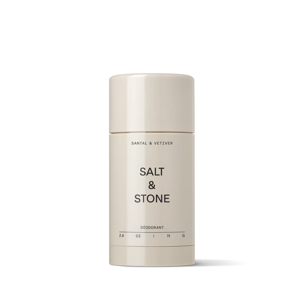 A stick of salt & stone deodorant against a neutral background.