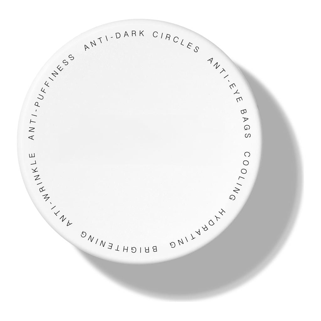 A top view of a white, round cosmetics jar with various skin care benefits printed on the lid.