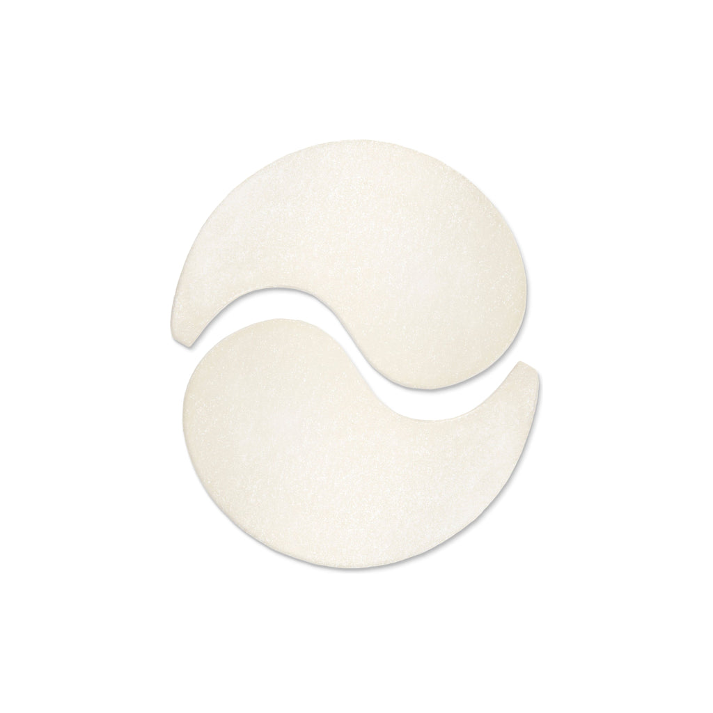 Two white cosmetic sponges on a plain background.