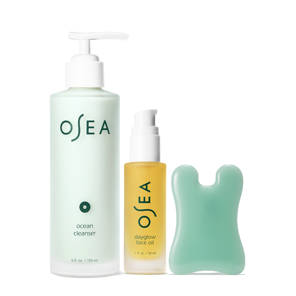 Three osea skincare products including an ocean cleanser and a dayglow face oil, presented on a white background.