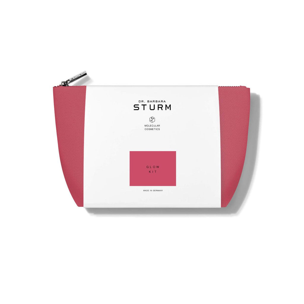 Cosmetic pouch for dr. barbara sturm glow kit on a white background.