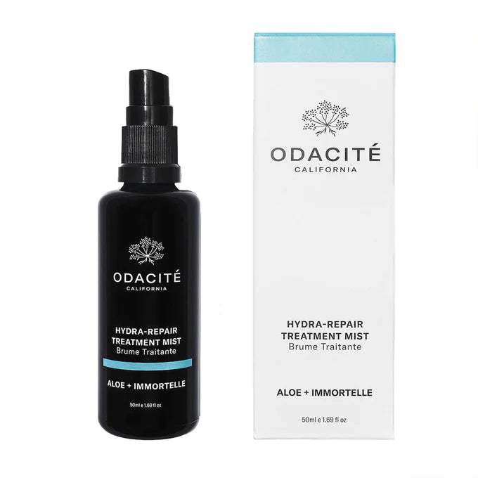 Bottle of odacite hydra-repair treatment mist next to its packaging box.