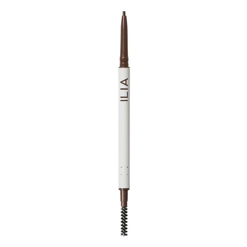 Eyebrow pencil with spoolie brush on white background.